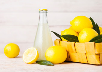 Wall Mural - Glass bottle of organic fresh lemon juice fruits