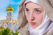 © Yury Kisialiou - Beautiful pure girl with a clear look in a white scarf addresses prayer to God