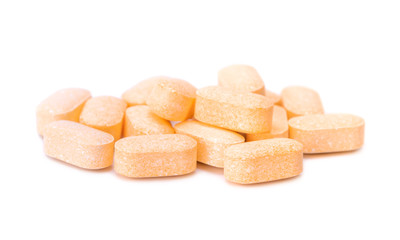 Heap of Vitamin C tablets