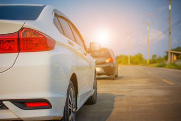 Close up of car parked on the asphalt road