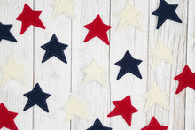 Patriotic Red, White And Blue Stars On Weathered Whitewash Textured Wood Background