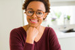 © Krakenimages.com - Beautiful young african woman with afro hair wearing glasses