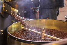Freshly Roasted Aromatic Coffee Beans In A Modern Coffee Roasting Machine