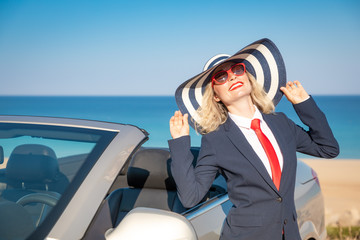 Poster - Successful young businesswoman on a beach