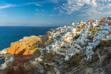 Santorini greece famous Oia in sunset time golden hour 