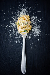 Wall Mural - homemade spaghetti with cream, spinach and parmesan