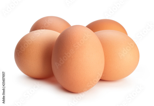 Cuadros en Lienzo heap of chicken eggs isolated on white background