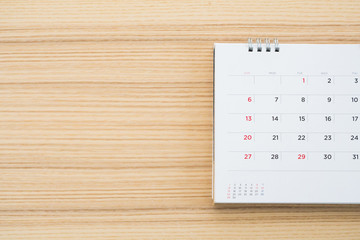 calendar page on wood table background