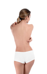 Wall Mural - Back view of woman with perfect smooth skin on white background. Beauty and body care