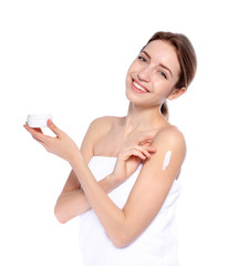 Wall Mural - Young woman with jar of cream on white background. Beauty and body care