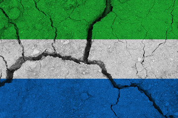 Wall Mural - sierra leone flag on the cracked earth