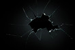 © runrun2 - broken cracked glass with big hole over black background