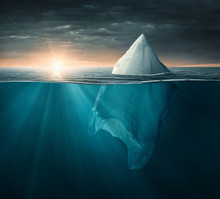 Plastic Bag In The Ocean Looking Like An Iceberg, With Copy Space