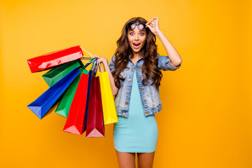 Close up photo beautiful her she lady yell scream shout new staff shopping spree excited big choice choose wear specs blue teal green short dress jeans denim jacket clothes isolated yellow background