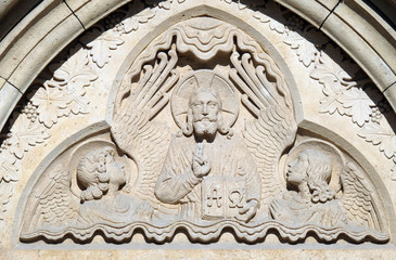 Wall Mural - Relief of Jesus the Pantocrator from side portal of church of St. Matthias near the fisherman bastion in Budapest, Hungary