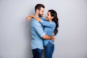 Canvas Print - Photo profile side view of comfort cozy beautiful couple affectionate passionate delighted in denim clothing isolated on silver background