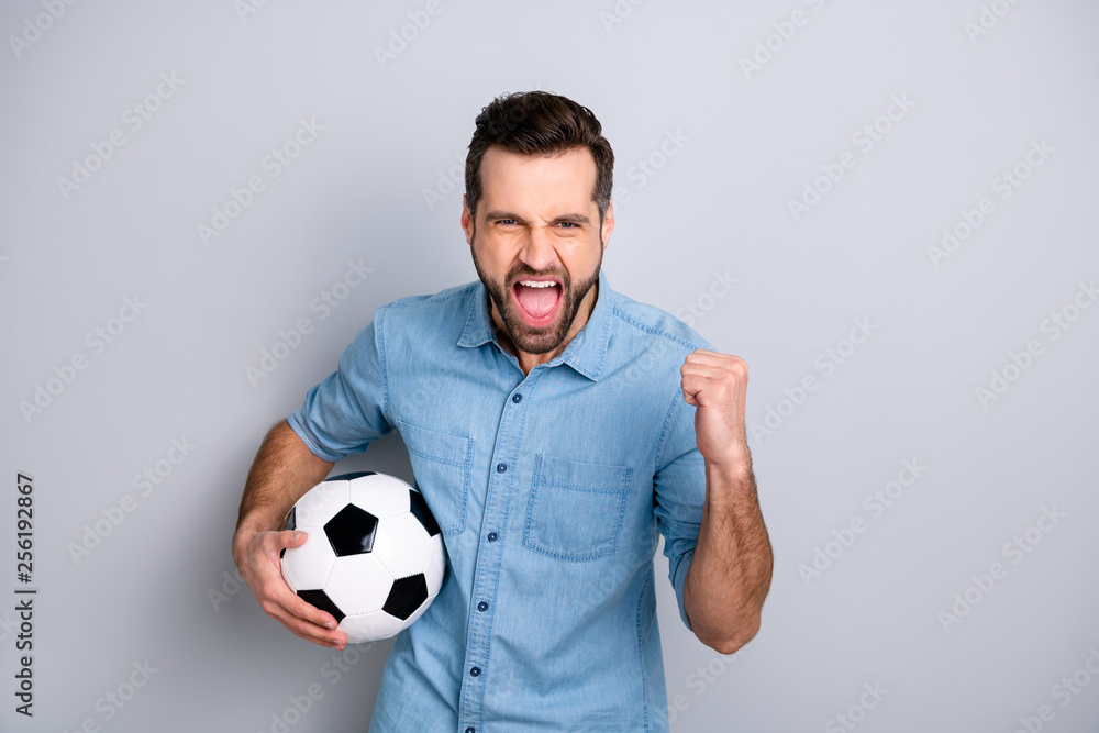 Close up photo macho he him his gentleman guy hold football leather ball watch match game true fan yelling loud amazed wear casual jeans denim shirts outfit clothes isolated light grey background - obrazy, fototapety, plakaty 