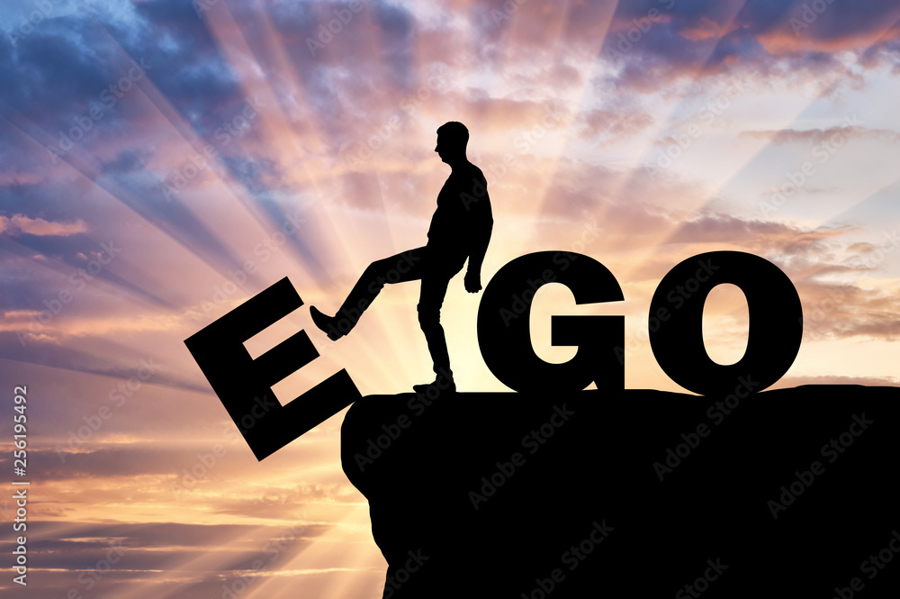Silhouette of a man gets rid of the ego as a bad habit - obrazy, fototapety, plakaty 