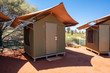 Safari tent in middle of Australian red centre swag camp site in NT outback Australia