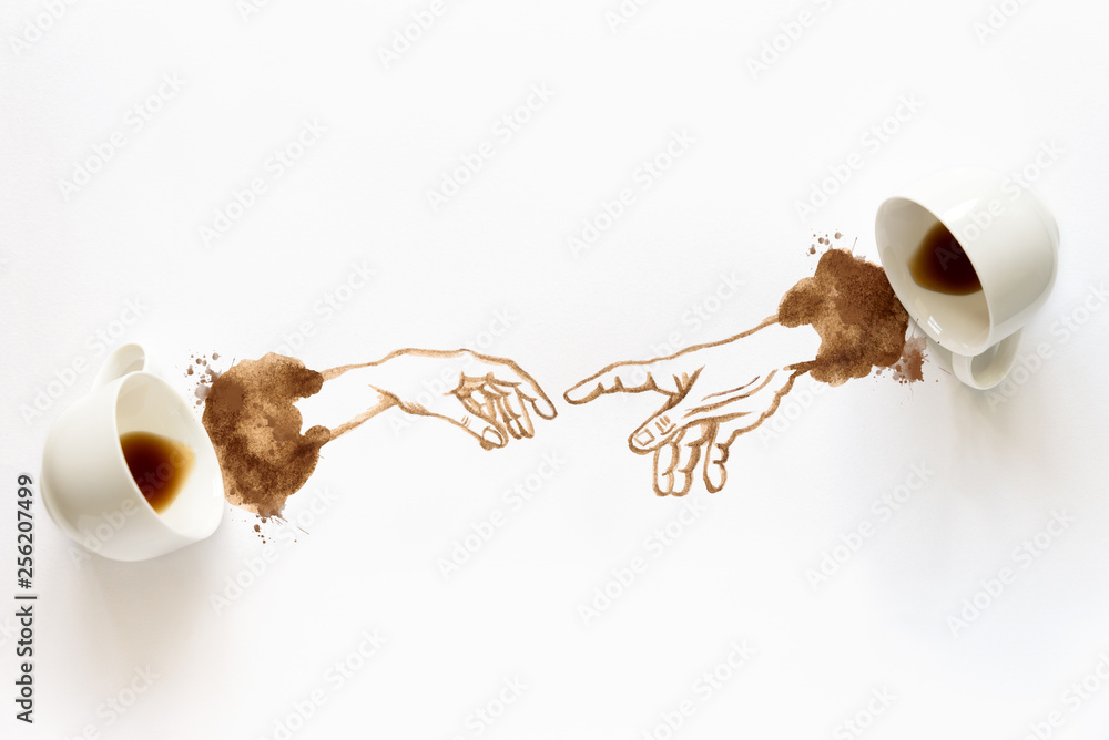 Two espresso cups with hand drawing hand to hand. Helping hands, coffee art or creative concept. Top view - obrazy, fototapety, plakaty 