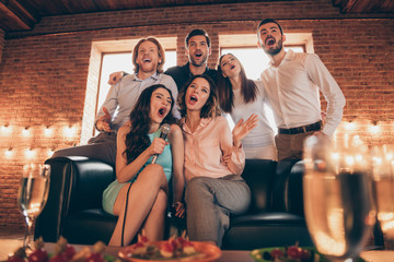 Sticker - Close up photo buddies karaoke birthday company hang out shout yell scream sing she her ladies he him his guys wineglasses golden beverage wear dresses shirts formalwear sit sofa loft room indoors