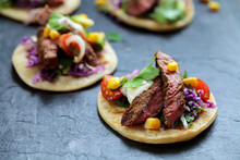 Beef Steak Tortillas With Avocado, Sweet Corn, Tomato Salsa And Red Cabbage