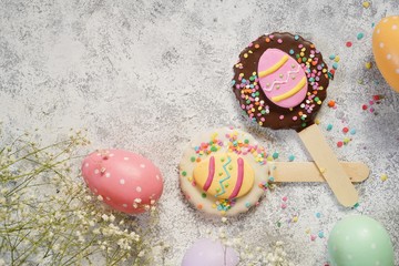 Easter spring background with decorated frosted cookies, selective focus