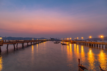 time lapse stunt sunrise Chalong pier. Chalong pier very important for travel business it is a center for all boat .and yacht marina there have two piers for transport service tourists