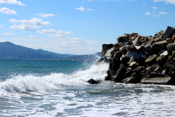 Freshness of the sea wave on a sunny day in Greece