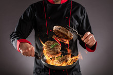 Closeup Of Chef Throwing Beef Steaks Into The Air