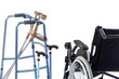 © JPC-PROD - set of mobility aids including a wheelchair, walker, crutches, quad cane, and crutches.