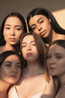 © LIGHTFIELD STUDIOS - five attractive multicultural young women looking at camera in sunlight