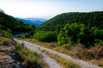 Wall Mural - Road between mountains