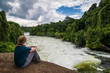 © Westend61 - Africa, Uganda, Jinja, Tourist watching the Nile falls