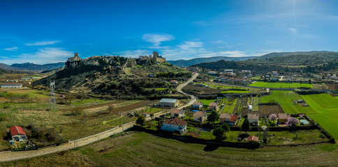 Wall Mural - Frias aerial panorama of the medieval village with a castle and fortified bridge near Burgos in Castile and Leon Spain