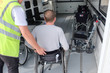 person with a disability, wheelchair traveler boarding an ambulift, disable tourist, handicapped person