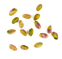 Wall Mural - peeled pistachio nuts isolated on white