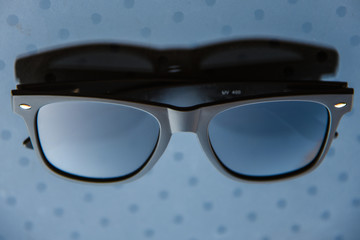 sunglasses in a black frame