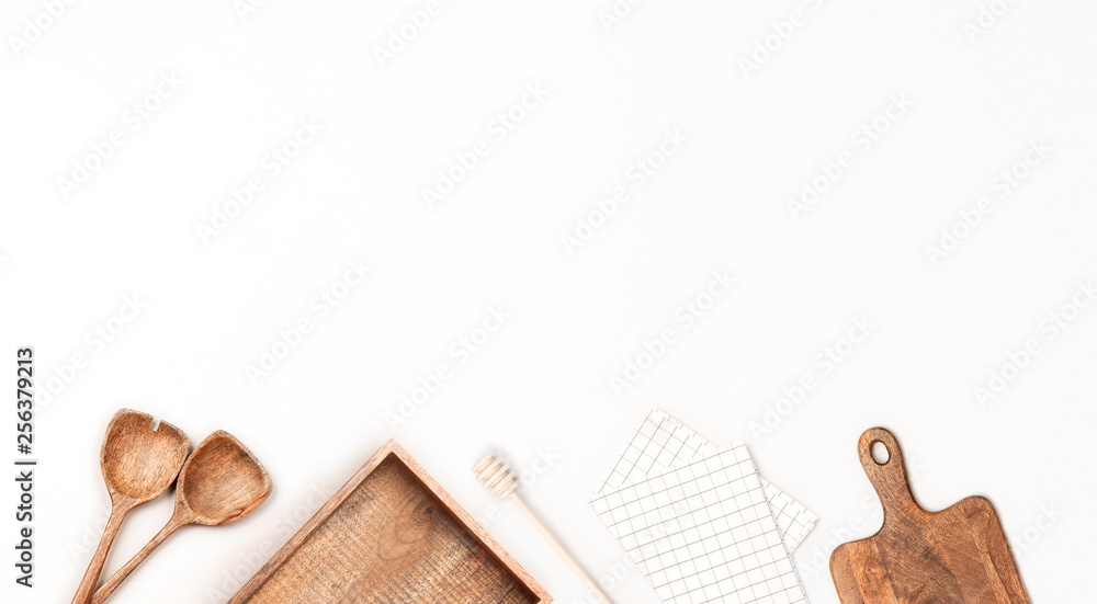 Wooden kitchen utensils on white background. Flat lay, top view. Stock ...