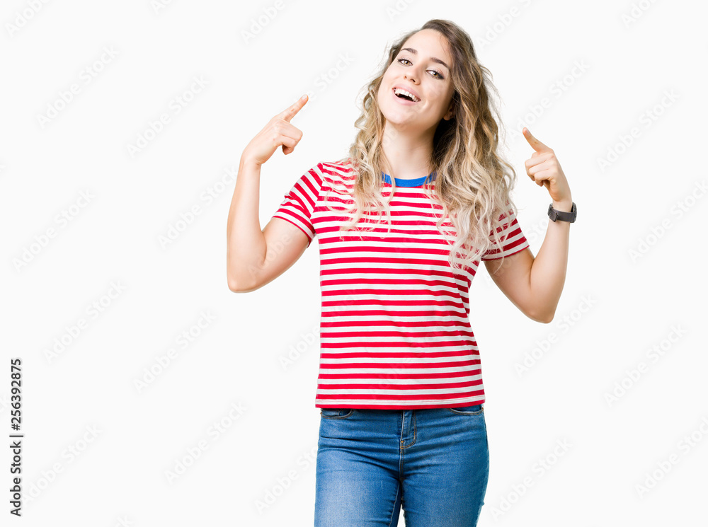 Beautiful young blonde woman over isolated background Smiling pointing to head with both hands finger, great idea or thought, good memory - obrazy, fototapety, plakaty 