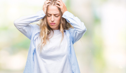 Sticker - Beautiful young blonde woman over isolated background suffering from headache desperate and stressed because pain and migraine. Hands on head.