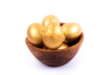 Golden And Silver Colored Easter Eggs In Wooden Bowl Isolated On White Background. Place For Text.