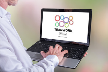 Teamwork concept on a laptop