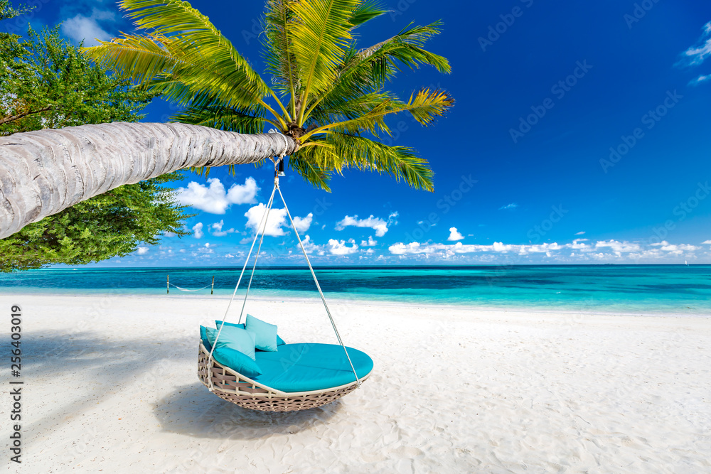 Tropical beach background as summer landscape with beach swing or hammock and white sand and calm sea for beach banner. Perfect beach scene vacation and summer holiday concept. Boost up color process - obrazy, fototapety, plakaty 