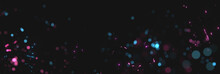 Blurred Magenta And Cyan Sparks From Neon Lights In Front Of Black Backgound