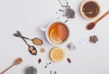 Creative Composition Witn Variety Of Tea, Sugar, Lemon And Other Accessories For Making Tea