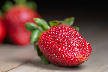 red shiny ripe strawberry