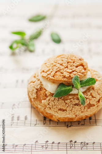 Homemade Profiteroles On The Music Sheet With Notes Profiteroles