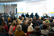 © jollier_ - People in the hall listen to the lecturer. Businessman and people Listening on The Conference