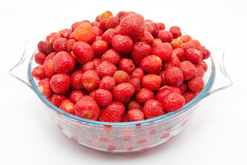 Wall Mural - Red fresh strawberry in a bowl isolated on white background